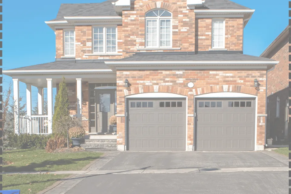 Brick home with an attached two-car garage